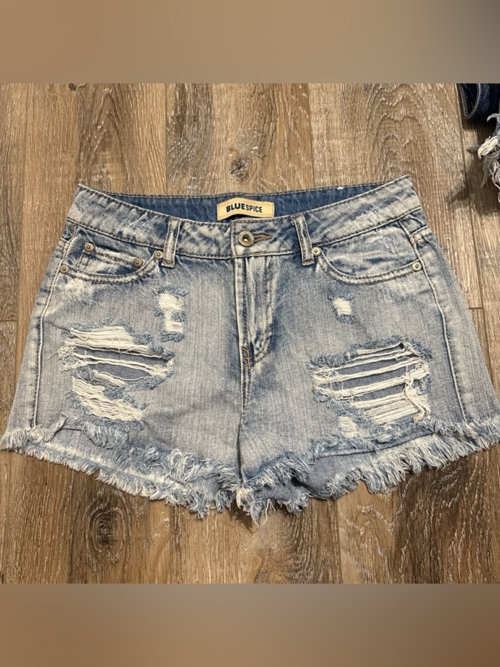 Blue Spice Light Wash Distressed Denim Cutoff Shorts